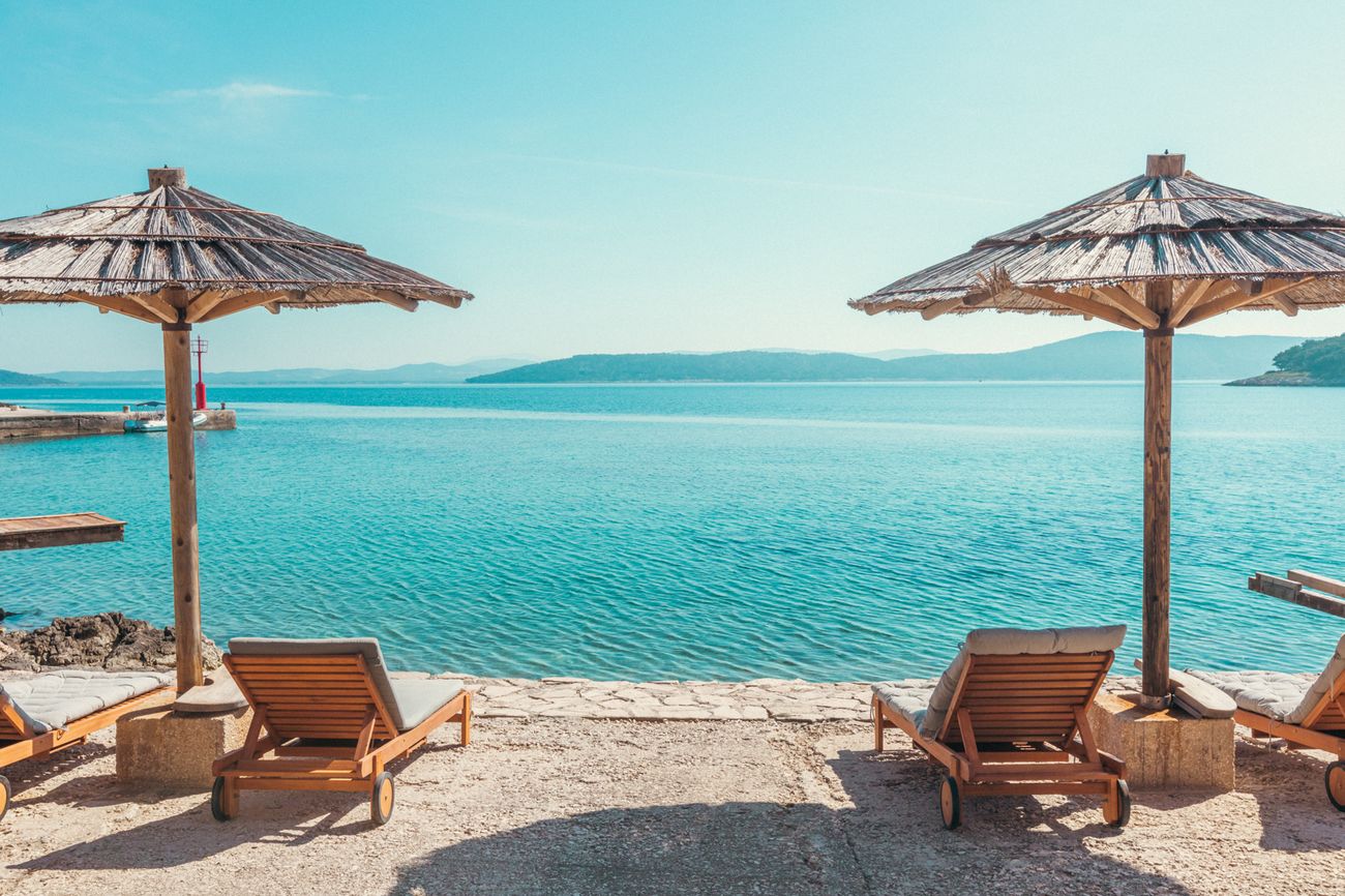 The beach club and the turquoise bay